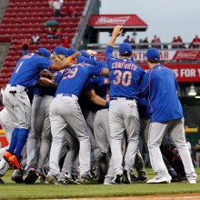 CINCINNATI, OH - SEPTEMBER 27: The New York Mets celebrate after defeating the Cincinnati Reds 10-2 to clinch the National League East Championship at Great American Ball Park on September 26, 2015 in Cincinnati, Ohio.  (Photo by John Sommers II/Getty Images)